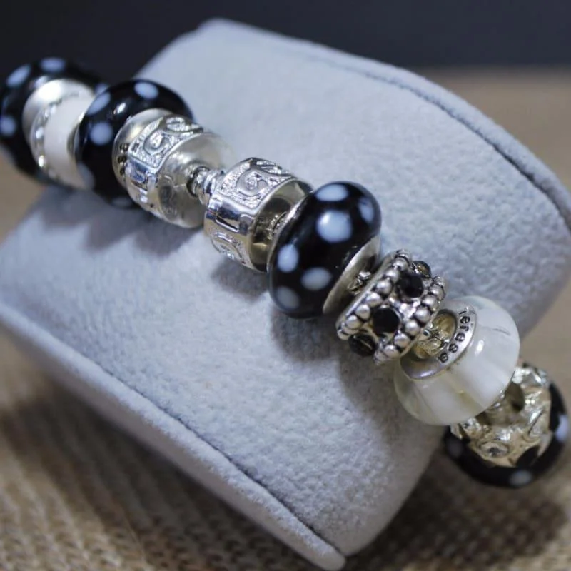 men's silver charm bracelet-Black and White Pawprint Murano Glass Charm Bracelets