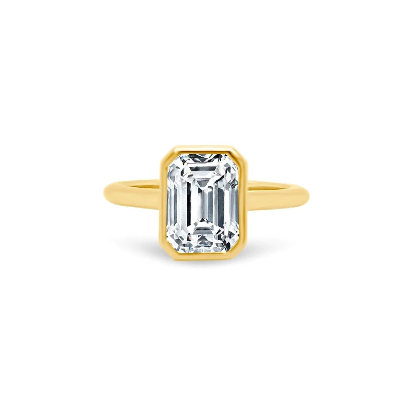 solitaire wedding rings for women-North South Bezel Set Emerald Cut Solitaire