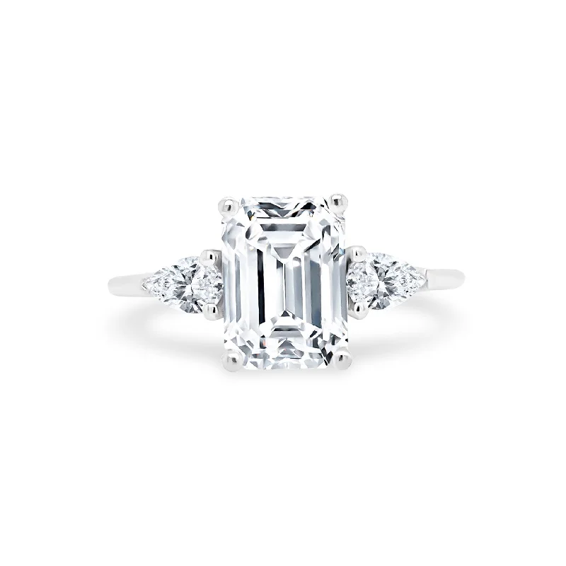 engagement rings with emerald and diamonds-Emerald Cut with Pear Cut Side Stones