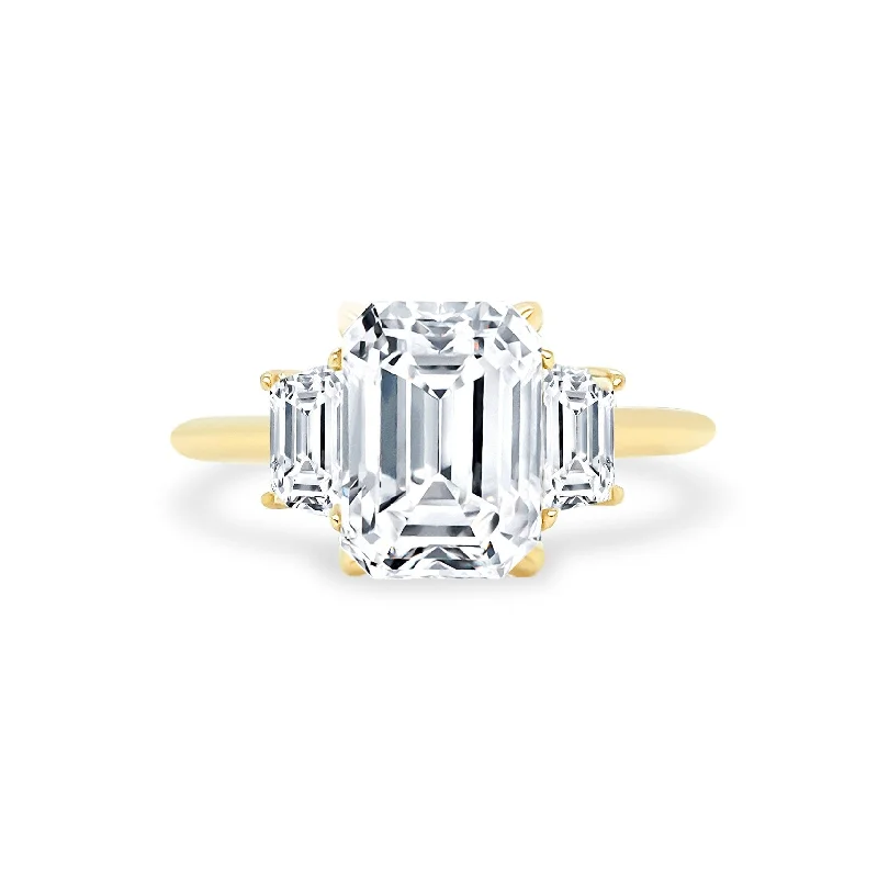 engagement rings with multi-stone designs-Emerald Cut with Trapezoid Cut Side Stones