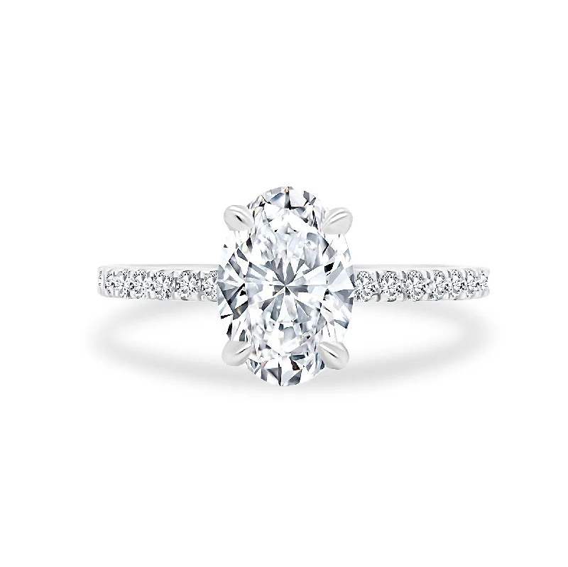 affordable diamond wedding rings-Oval Cut Solitaire on Diamond Band