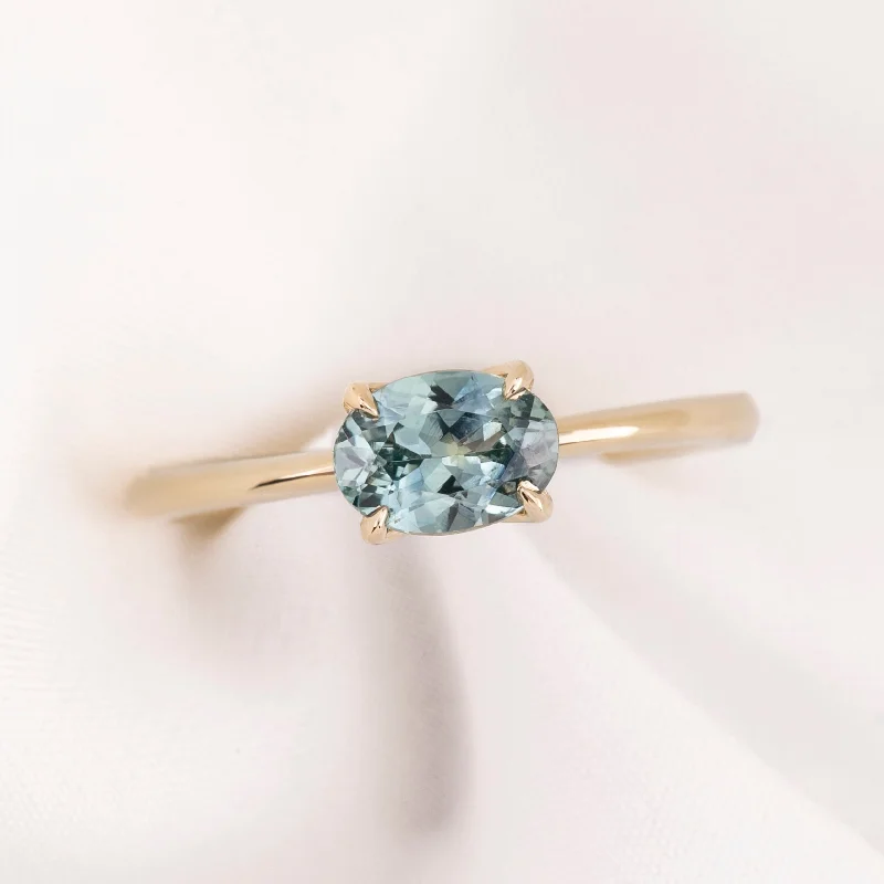 large sapphire engagement rings-Sara Ring 1.04ct Light Blue Green Oval Montana Sapphire, 14K Yellow Gold (One of a kind)