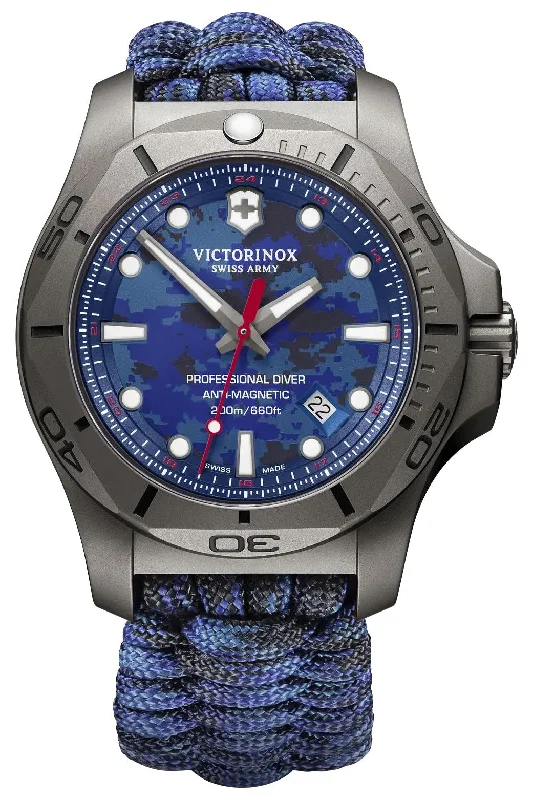 best watches for casual work attire-Victorinox Swiss Army I.N.O.X. Professional Diver Gray Titanium Blue Dial Blue Textile Interchangeable Blue Rubber Strap Date Quartz Mens Watch 241813.2